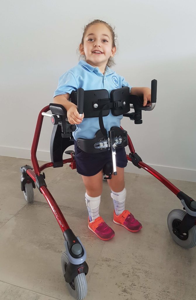 Assistive technology, girl in walker