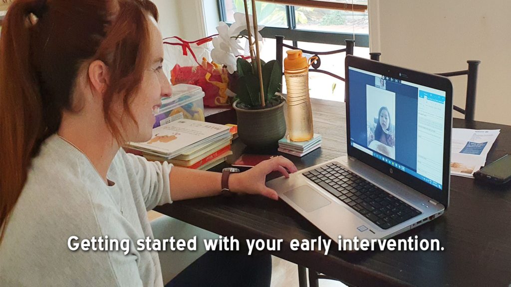 Therapist talking with child on screen